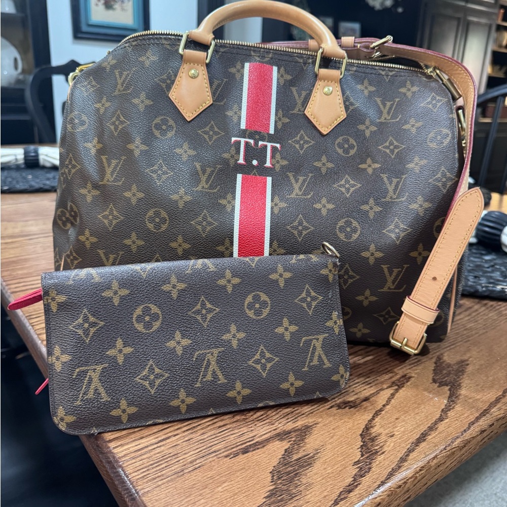 Louis Vuitton Brown Monogram Duffel Bag with Red Stripe